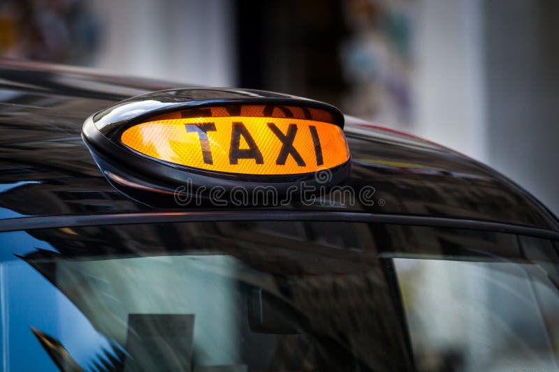 Taxi podpisuje wewnątrz UK