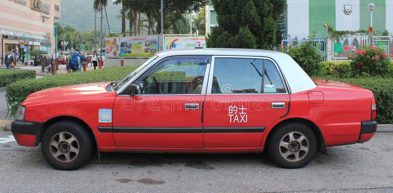 Taxi rojo en Hong-Kong fotos de archivo Taxi rojo en Hong-Kong fotos de archivo