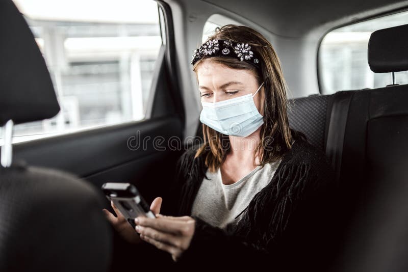 A Taxi or Uber Passenger Talking through the Phone on the Back Seat Stock Photo Image of