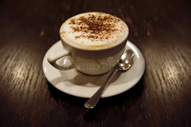 Cup of cappucino (toned in sepia). Cup of cappucino (toned in sepia)