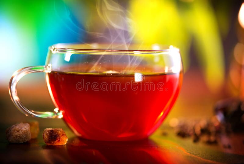 Cup of Healthy Tea over Nature Green background. Herbal Tea. Cup of Healthy Tea over Nature Green background. Herbal Tea