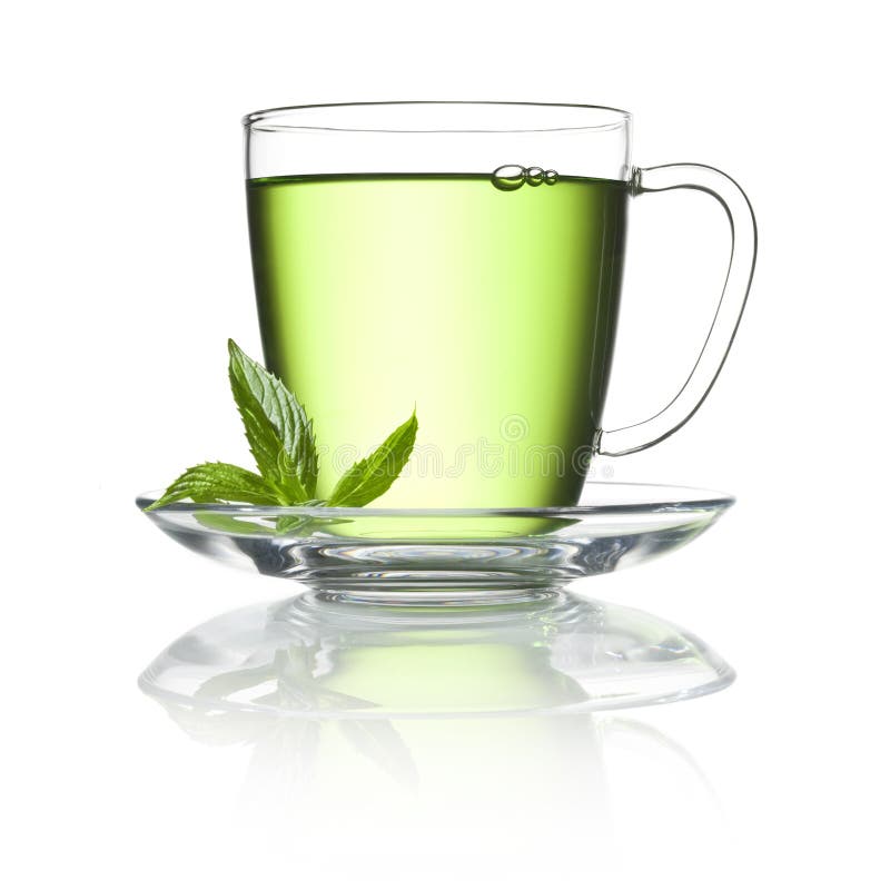 Taza de té verde de la hierbabuena fotografía de archivo Taza de té verde de la hierbabuena fotografía de archivo