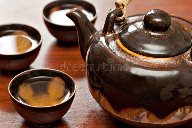 Taza de té y de tetera imagenes de archivo