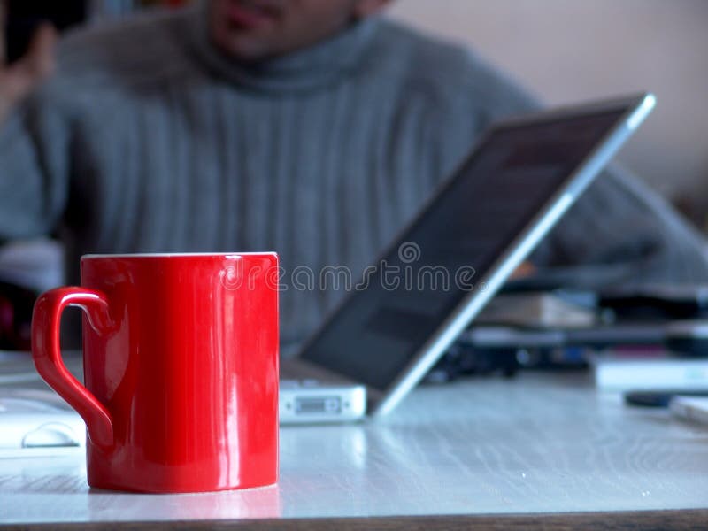 A red business cup. A red business cup