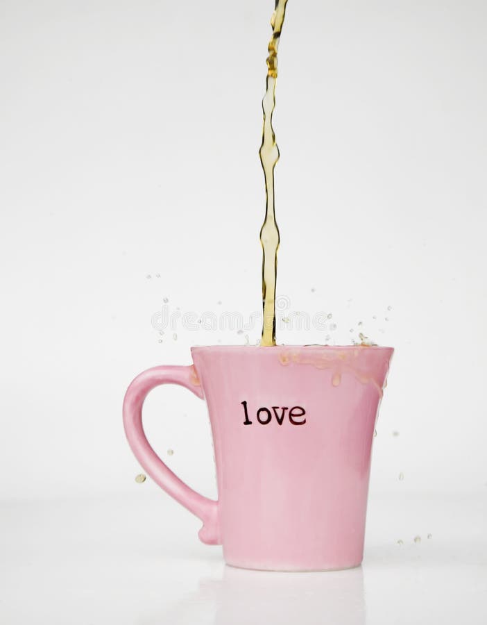 Tazza di amore della spruzzata del caffè immagine stock libera da diritti Tazza di amore della spruzzata del caffè immagine stock libera da diritti