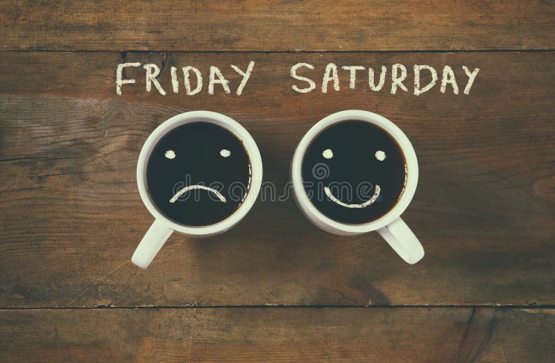 Coffee cup with sad and happy faces next to friday saturday phrase background. vintage filtered. happy weekend concept. Coffee cup with sad and happy faces next to friday saturday phrase background. vintage filtered. happy weekend concept.