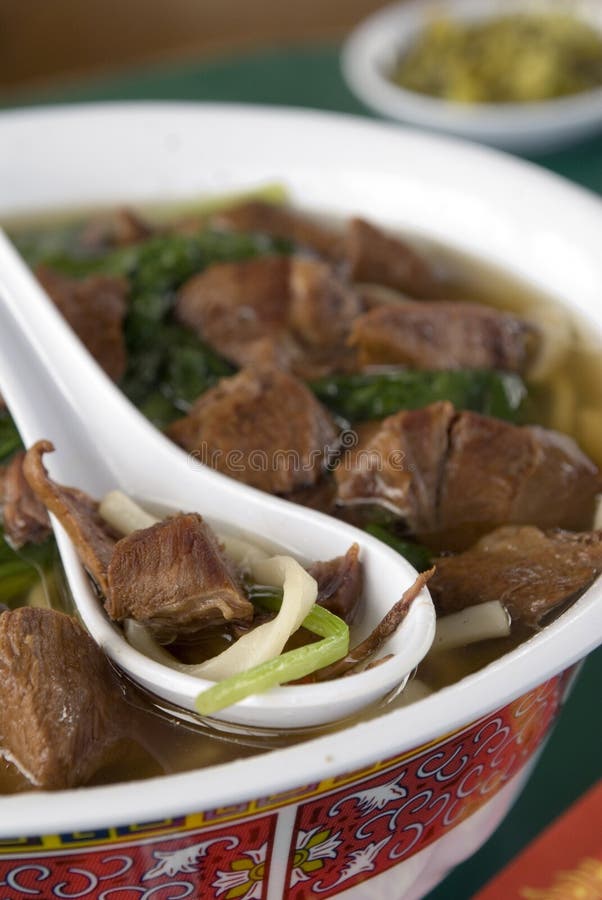 Asian Beef noodle bowl with spinach. Asian Beef noodle bowl with spinach