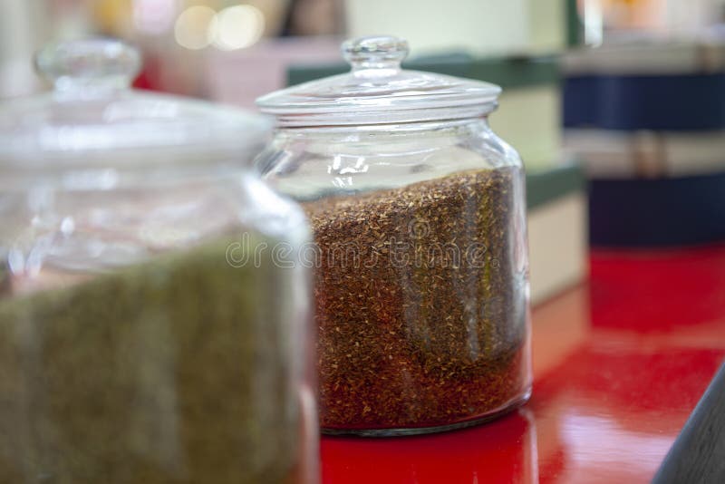 https://thumbs.dreamstime.com/b/tea-blends-glass-jars-counter-cafe-bright-colors-tea-tea-blends-glass-jars-counter-cafe-148003496.jpg