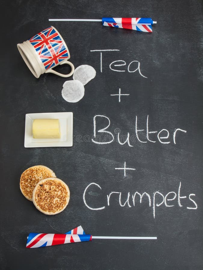 Tea Butter and Crumpets on a Blackboard with British Flags Stock Photo
