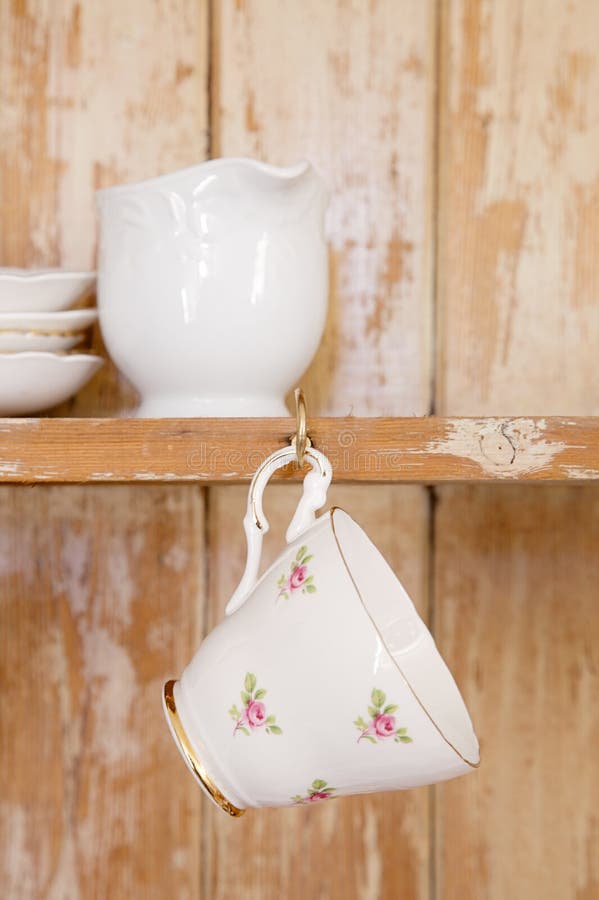 Tea Cup Hanging on a Hook in Old Wooden Cupboard Stock Image Image of