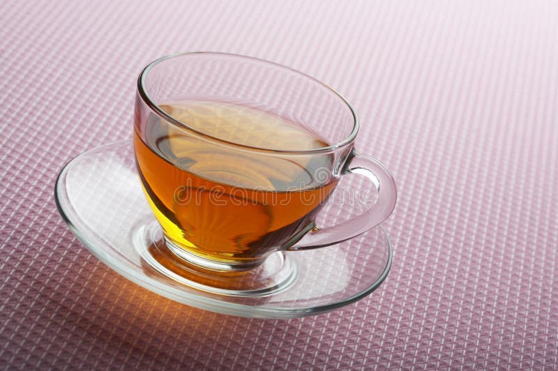 Tea cup on pink background