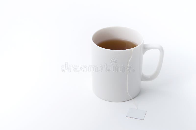 Tea cup with tea bag stock photo. Image of white, heat 89010746