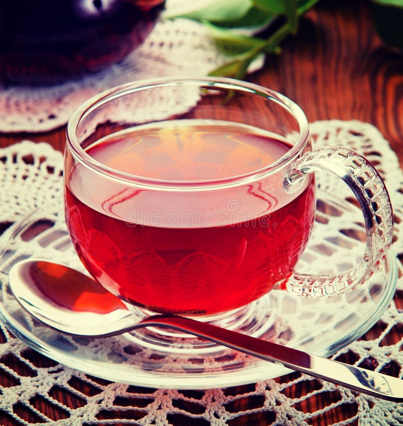 Tea in a Glass Cup. Vintage Retro Hipster Style Version Stock Photo