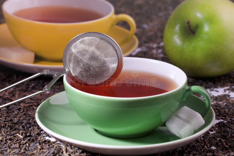 Tea in a green cup stock photo. Image of healthy, saucer 12016568