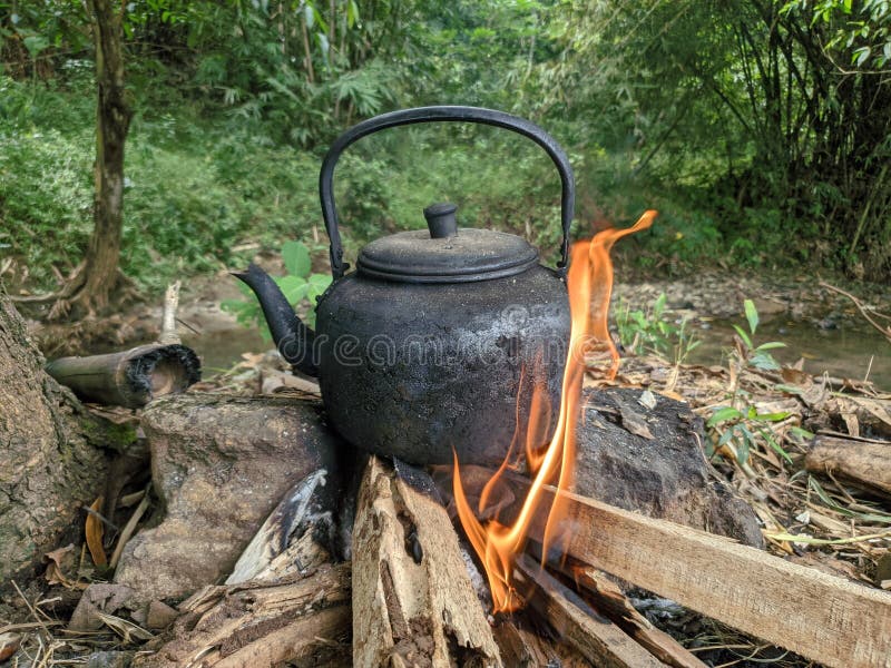 Tea Kettle on Open Fire. Tea in the Camping Stock Image - Image of active,  heat: 223966251