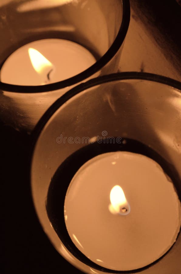 2 Tea Light Votive Candles in Clear Glass Overhead View Stock Image