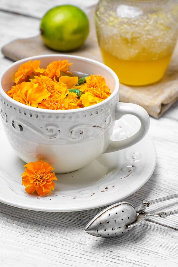 Tea with marigolds stock image. Image of therapeutic 77174517