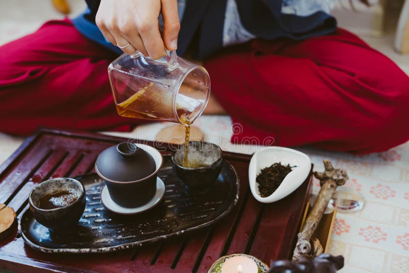 Tea Master Pours Chinese Tea Stock Photo Image of people, pottery