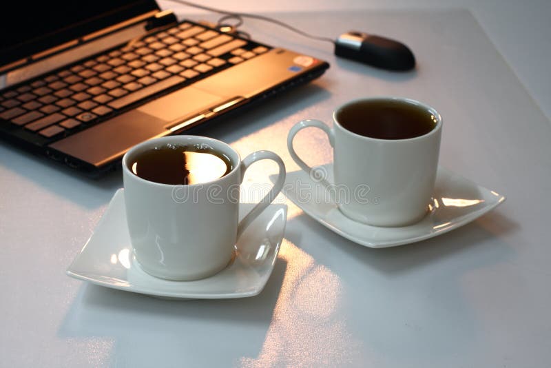 Tea at office stock photo. Image of tableware, laptop 10842716