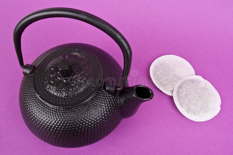 Tea Pot with Tea Bags stock photo. Image of beverage 14629098