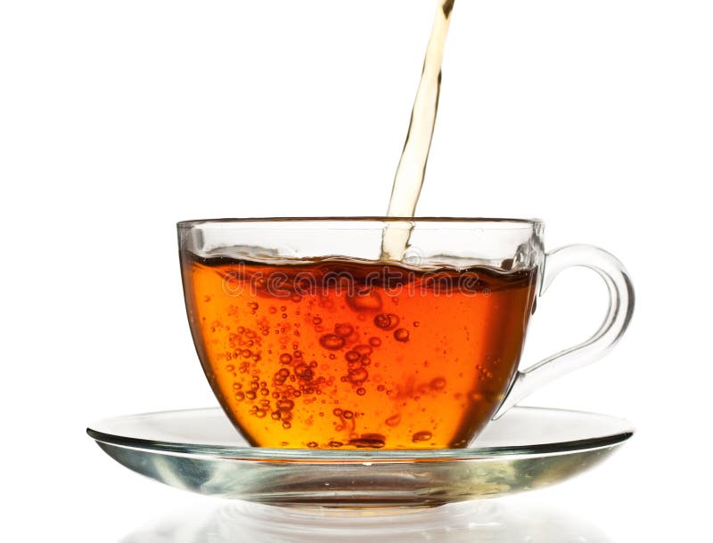 Tea pouring in the cup stock photos Tea pouring in the cup stock photos
