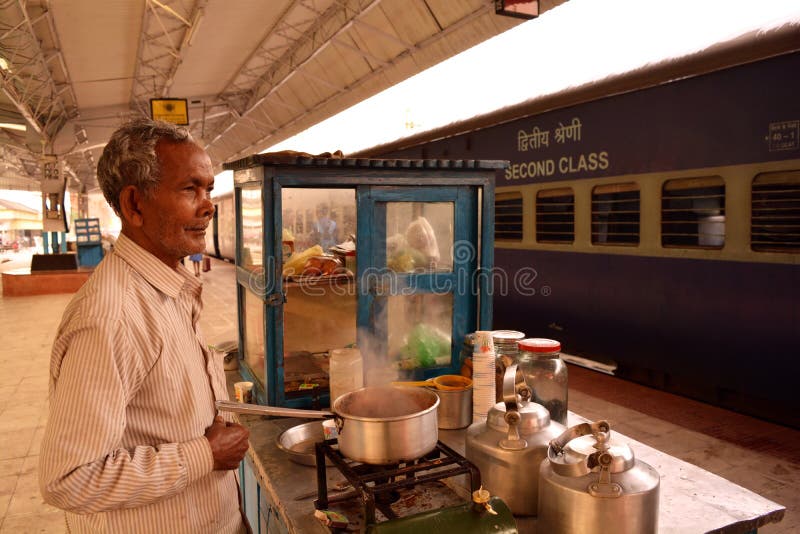 Tea vendor looking for customer in a station