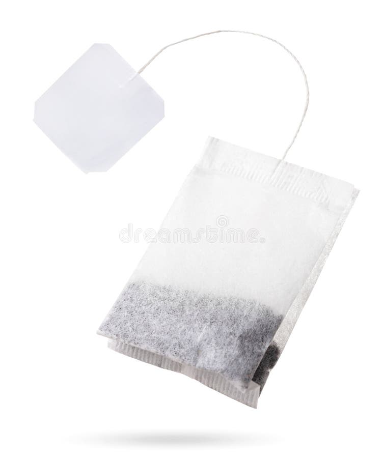 Teabag with white label flies on white background, isolated. Tea bag mockup