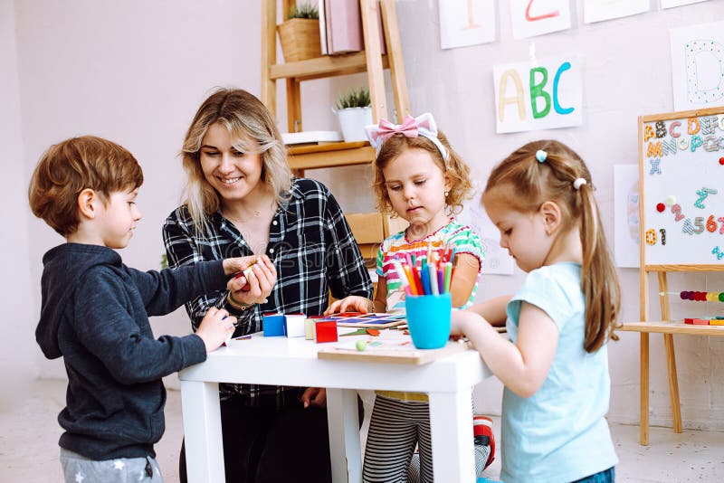 Teacher with Children Have Fun and Playing Games, Learning Alphabet and ...