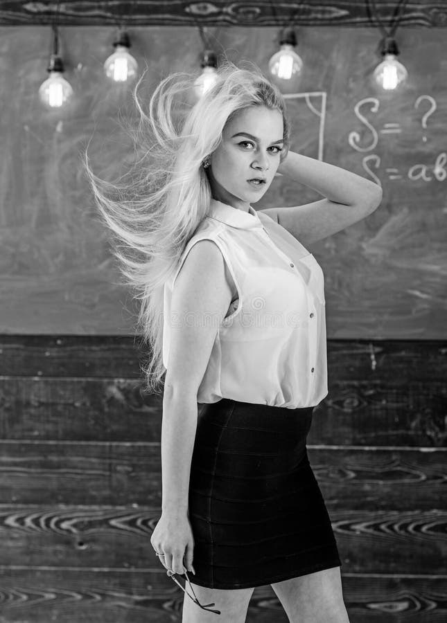 Teacher Concept Teacher With Waving Long Blonde Hair Looks Sexy Lady Strict Teacher On Dreamy