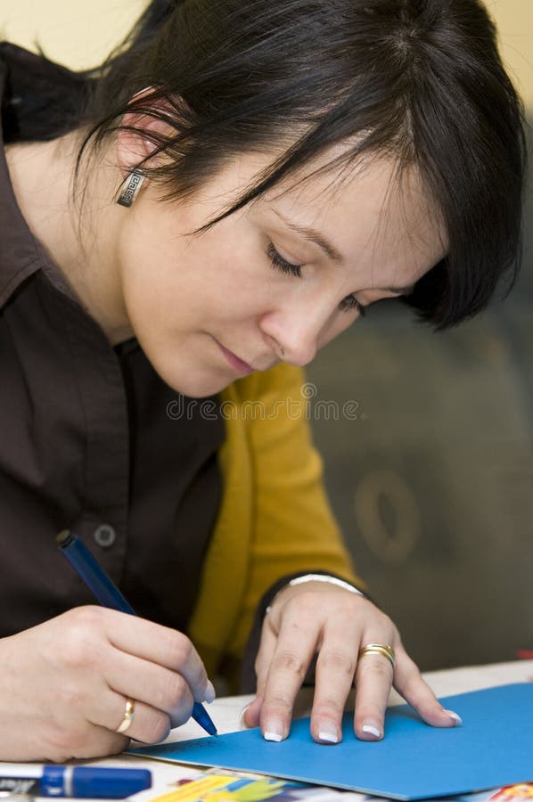 Teacher doing cutouts