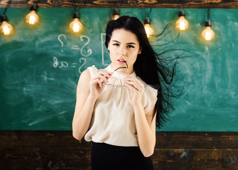 Student Xxx With Biology Teacher - Teacher with Glasses and Waving Hair Looks Sexy. Woman with Long Hair in  White Blouse Stands in Classroom Stock Image - Image of blouse, adult:  125833027
