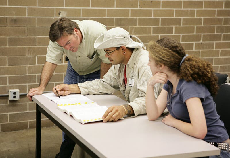 Teacher Helping Students