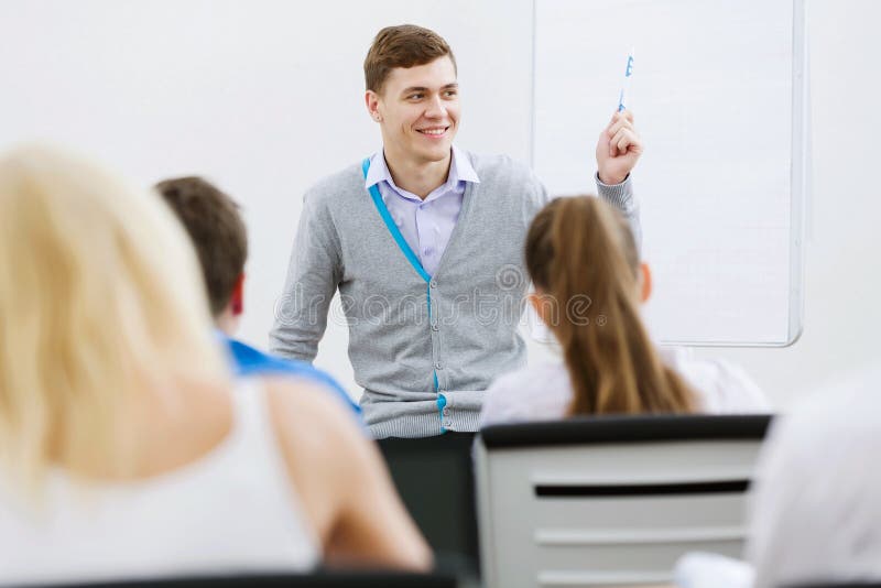 Teacher at lesson stock image