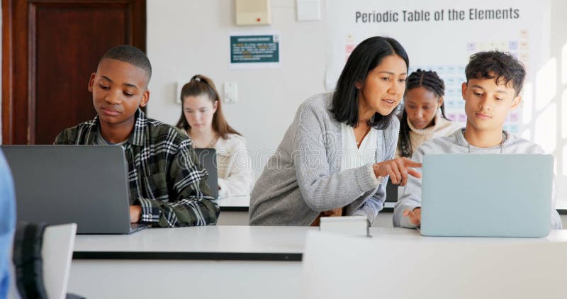 Teacher, students and science, laptop in classroom with learning, education and innovation with tech. Explain royalty free stock image