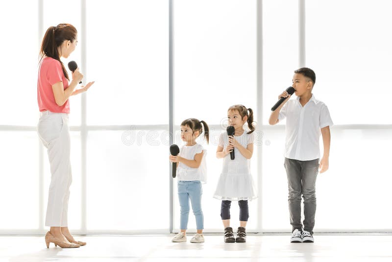 Tall girl teaches boy how to workout