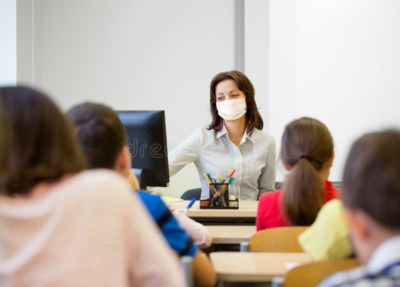 A Teacher and Students Wearing Face Masks · Free Stock Photo