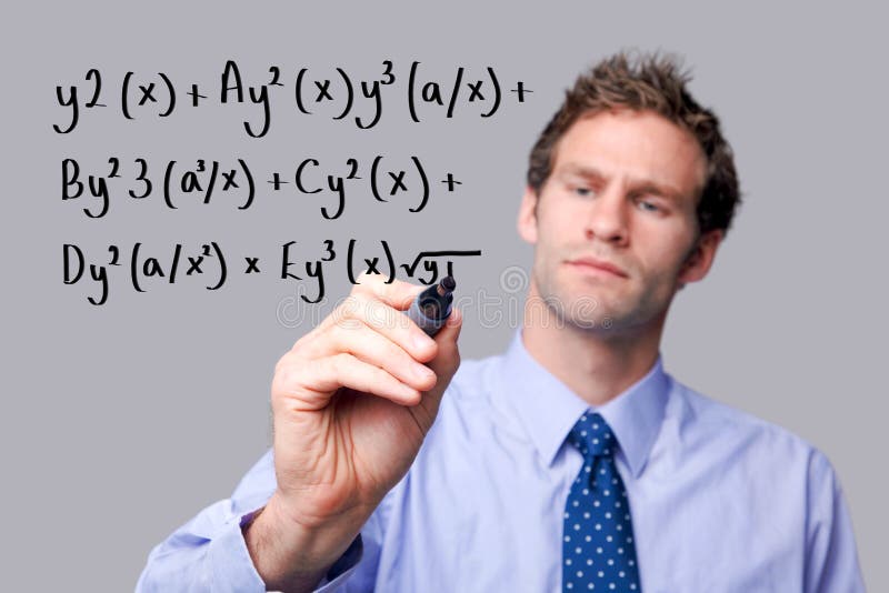 Teacher writing a maths equation. royalty free stock photo