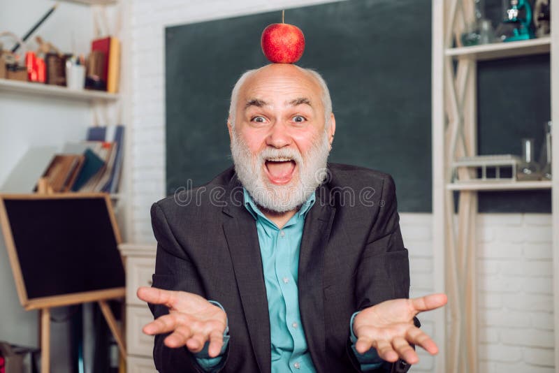 Teachers day - knowledge and educational school concept. Portrait of male University Teacher indoors. Teacher and royalty free stock image Teachers day - knowledge and educational school concept. Portrait of male University Teacher indoors. Teacher and royalty free stock image