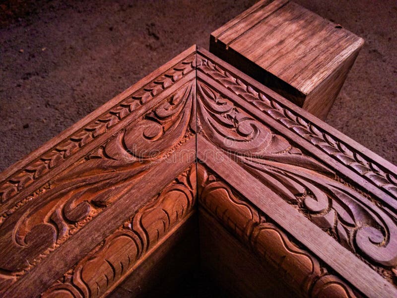 Teak wood hand carving stock image. Image of grains 240667149