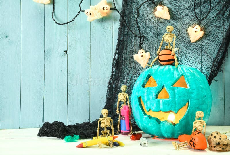 Teal pumpkin Jack O` Lantern indicates that this place provides allergy free non food treats for Halloween trick or treaters. Teal pumpkin Jack O` Lantern indicates that this place provides allergy free non food treats for Halloween trick or treaters