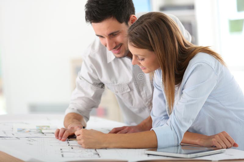 Team of architects working on a project royalty free stock photo Team of architects working on a project royalty free stock photo