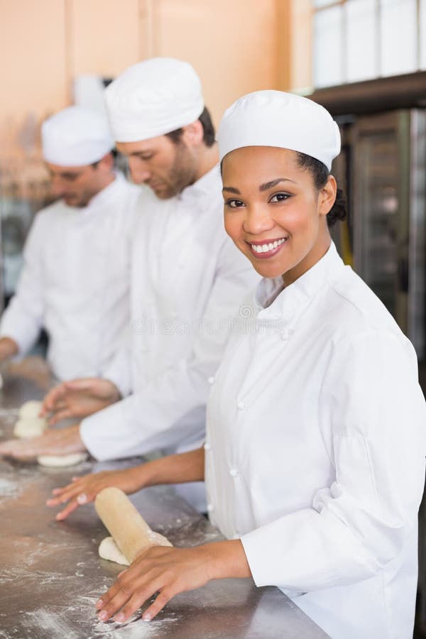 Team of Bakers Working at Counter Stock Photo Image of occupation, kneading 49288014