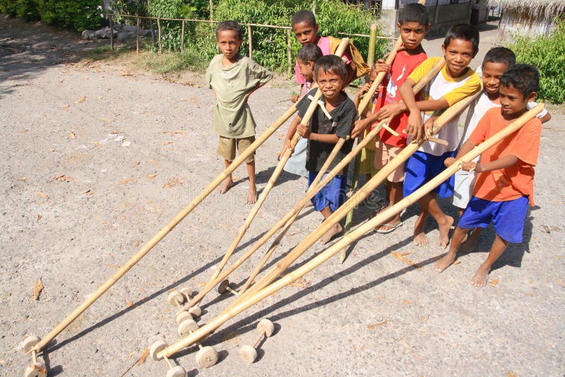 A team of boys with bamboo toys in Indonesia