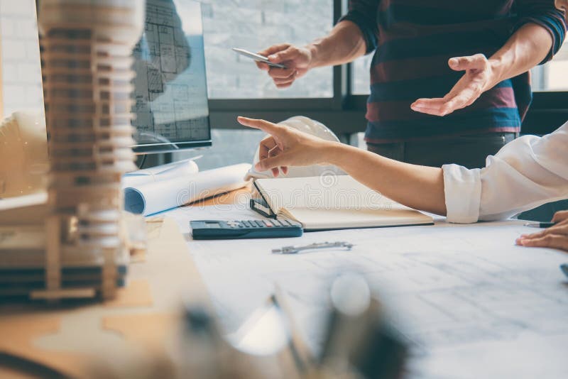 Team of Construction engineering or architect hands working on b royalty free stock image