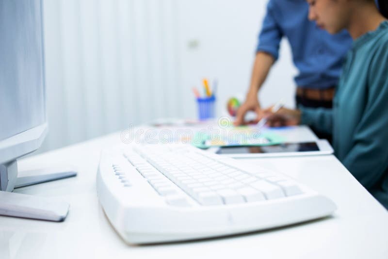 Team designers are testing mobile phone screen to suit their usage. UX UI and Programming development concept stock photo