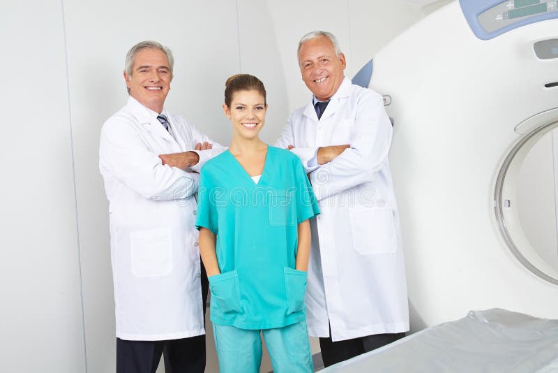 Team with Doctors and Nurses in Radiology with MRI Stock Photo Image