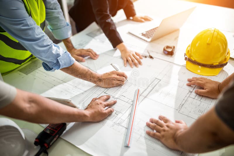 Team Engineer drawing graphic planning of interior creation project royalty free stock image Team Engineer drawing graphic planning of interior creation project royalty free stock image