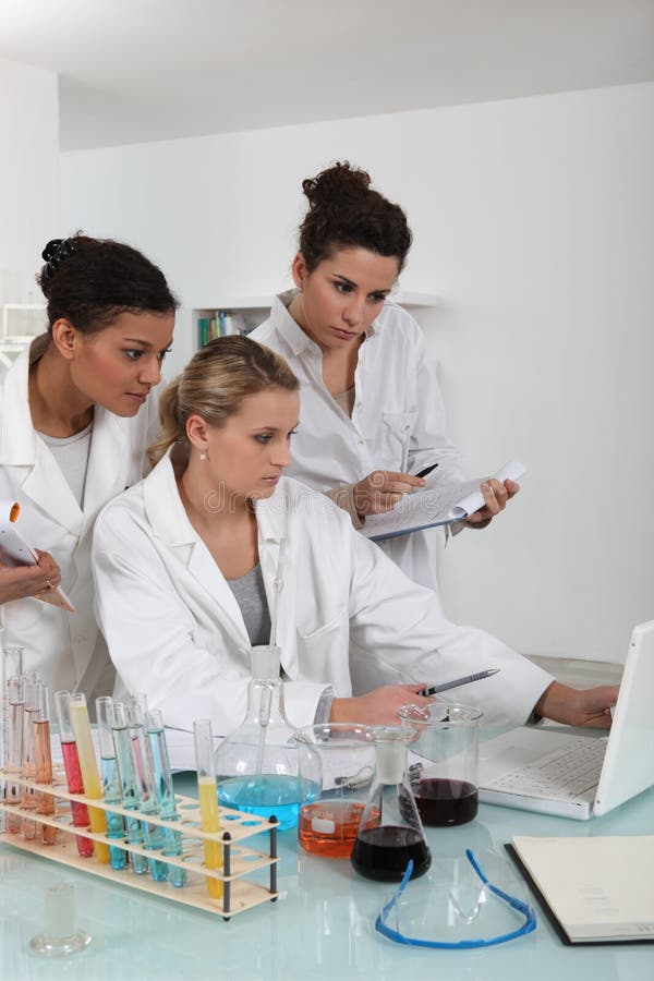 A team of female scientists royalty free stock image