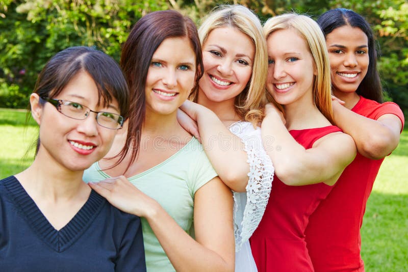 Team of happy women in nature stock photos