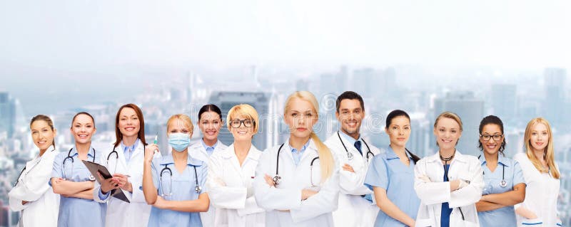 Medicine and healthcare concept - team or group of doctors and nurses. Medicine and healthcare concept - team or group of doctors and nurses
